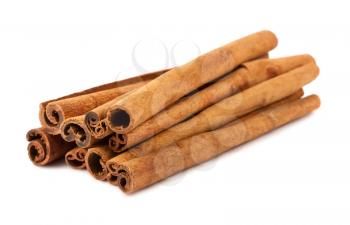 Brown dry cinnamon sticks isolated on white background