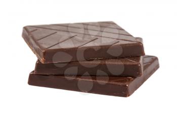 Three brown chocolate pieces isolated on white background