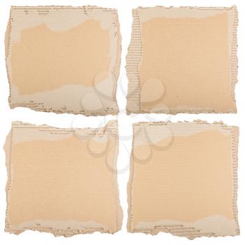 Four pieces of brown cardboard. Can be used as grunge background.
