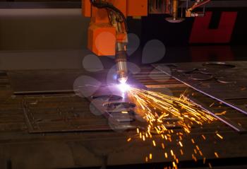 Industrial plasma cutting machine. When his work sparks fly. 