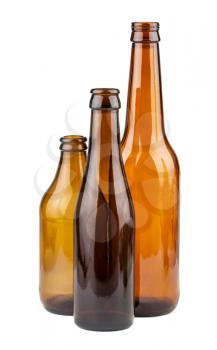 Three empty brown bottles isolated on white background