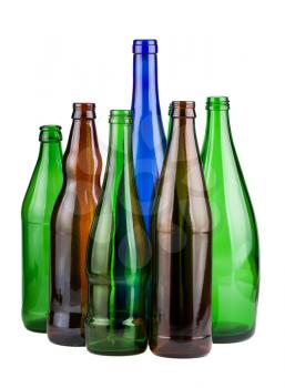 Six empty unlabeled bottles isolated on white background