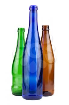 Brown, green and blue empty bottles isolated on white background