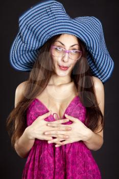 Royalty Free Photo of a Woman Wearing a Hat