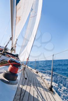 Royalty Free Photo of a Yacht Sailing in the Sea