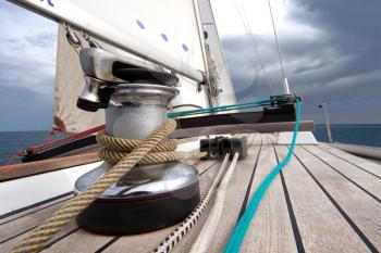 Royalty Free Photo of a Winch With Rope on a Sailing Boat in the Sea