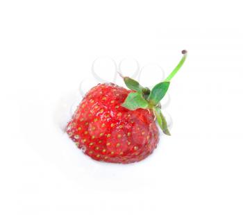 Royalty Free Photo of a Strawberry in Ice Cream