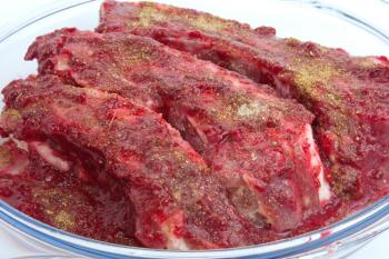 Royalty Free Photo of Pork Ribs in Cranberry Sauce