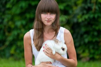 Royalty Free Photo of a Woman Holding a Bunny