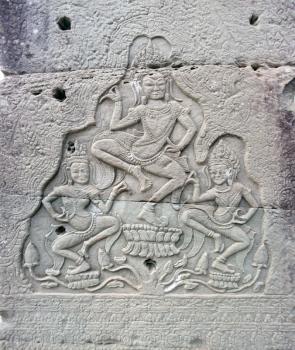 Dancing apsara on the wall in temple Prasat Bayon in Angkor complex, Siem Reap, Cambodia
