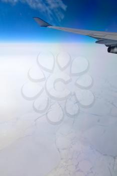 Frozen ocean, aerial view from illuminator of flying aircraft
