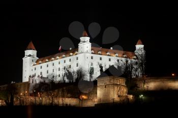 Stary hrad castle in Bratislava at night with illumination
