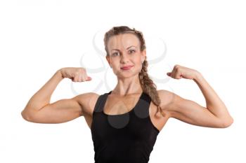 Athletic young woman showing biceps isolated on white
