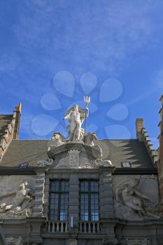 Neptune statue on the house in Gent, Belgium
