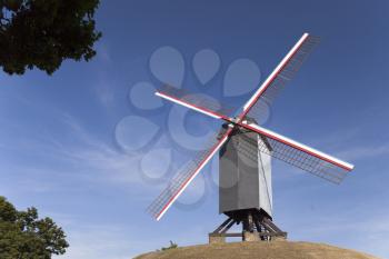 Wooden windmill on the hill in Bruges, Belgium

