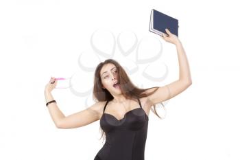 Surprised pretty girl with book, pen and glasses isolated on white background
