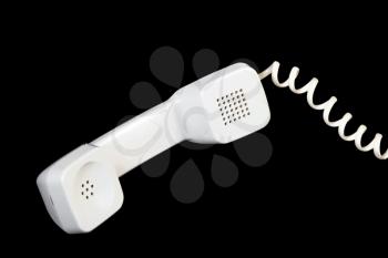 White handset isolated on black with clipping path
