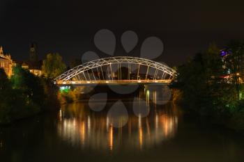 Metal bridge in Bamberg at night, Germany
