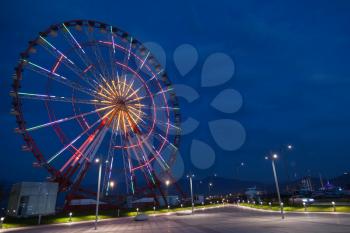 Ferris wheel and night park in Batumi, Georgia