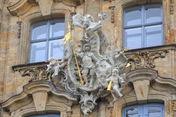 Knight with spear and angels with trumpets statues in Bamberg, Germany
