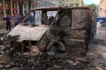 Burned car in the center of city after unrest in Odesa, Ukraine

