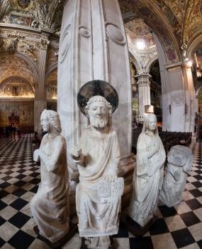 Ancient statues inside the roman catholic cathedral dedicated to Saint Alexander of Bergamo, Italy
