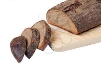 Cut bread on wooden board isolated on white