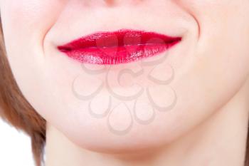 Woman mouth and lips with red lipstick
