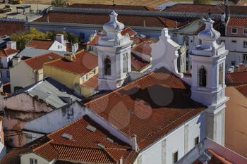 Igreja de Santo Estevao in Lisbon and house roofs, Portugal
