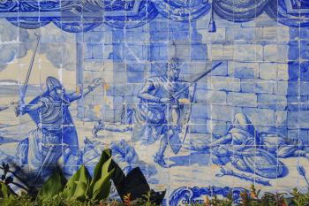 Battle scene made from blue tiles at Jardim Julio de Castilho, Lisbon, Portugal
