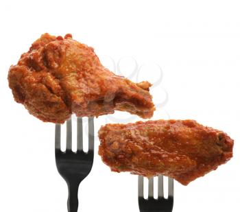 Royalty Free Photo of Chicken Wings on Forks