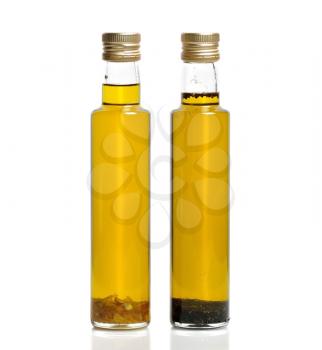 Royalty Free Photo of Bottles Of Garlic And Basil Olive Oil