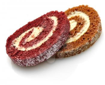 Royalty Free Photo of a Pumpkin and Strawberry Roll Cake Slices