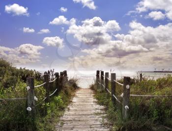 Royalty Free Photo of a Pathway to the Beach