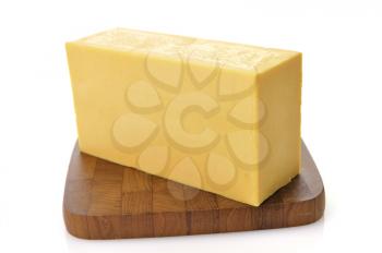 Royalty Free Photo of Cheese on a Cutting Board