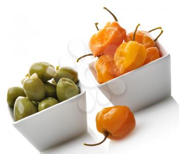 Royalty Free Photo of Yellow Hot Pepper And Green Olives