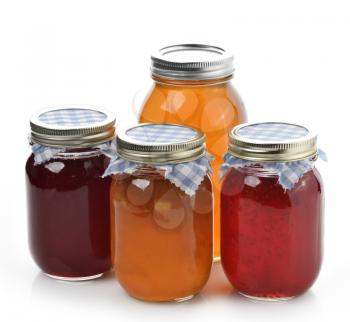 Homemade Marmalade,Jam And Honey In Glass Jars