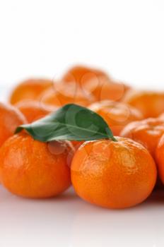 Mandarins , close up  on a white background