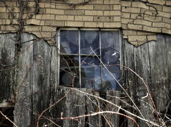 A Rustic Aged Barn with Broken Window