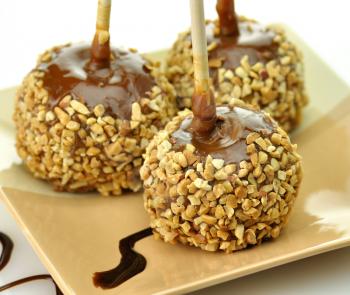 Candy apples with caramel sauce