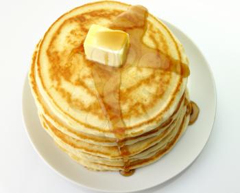 Golden pancakes with butter and maple syrup.
