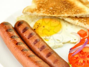 grilled polish sausages with egg and vegetables