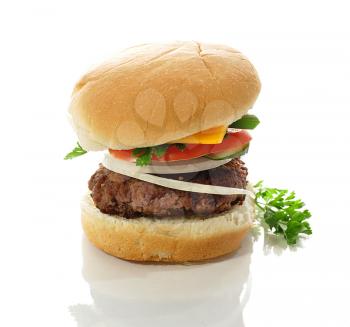 a cheeseburger on white background