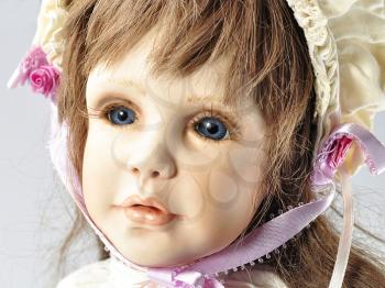 a vintage doll portrait , close up