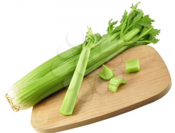 fresh celery on a cutting board