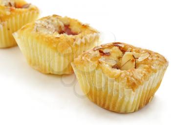 raspberry cupcakes with almonds , close up