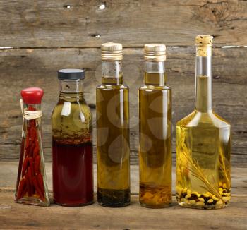 Cooking Oil Assortment On Wooden Background