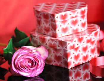 pink rose and gift boxes