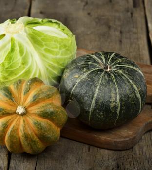 Squash And Cabbage On A Cutting Board