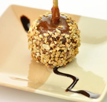 Candy apple with caramel sauce